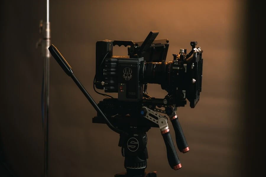 A camera standing on a tripod