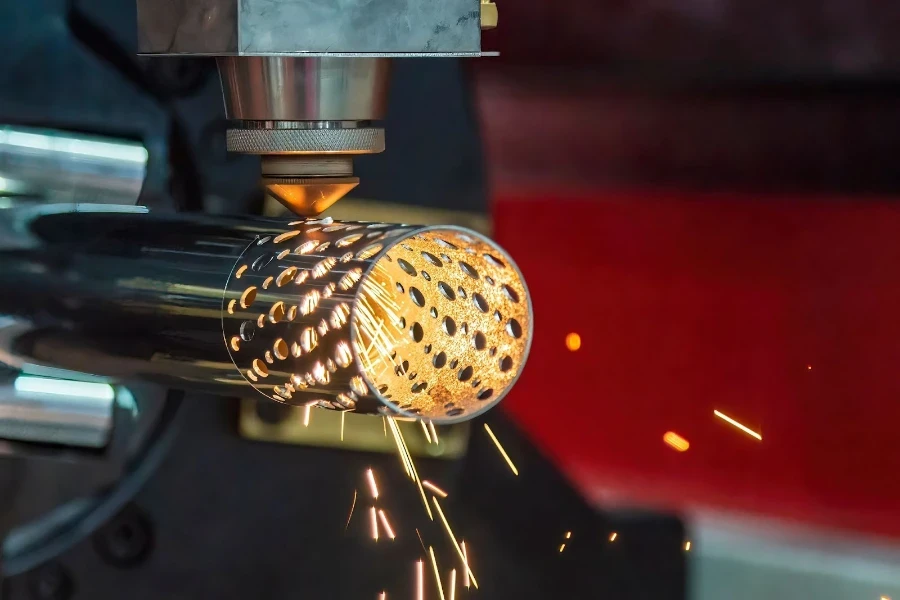 A fiber laser cutting machine cuts a stainless steel tube