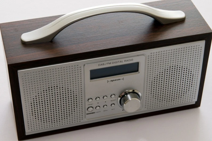 A boxy portable radio with a handle