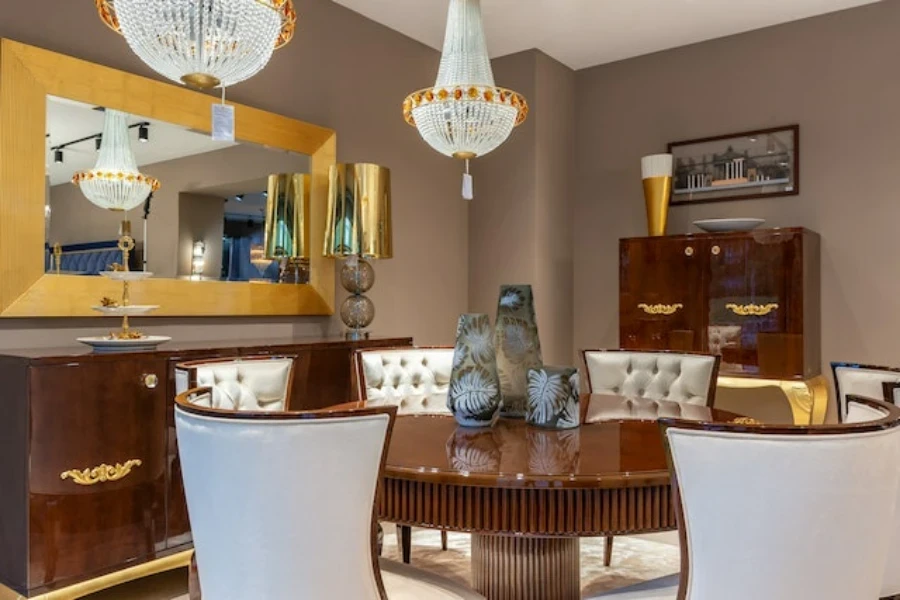 A gold-framed mirror placed in a dining room