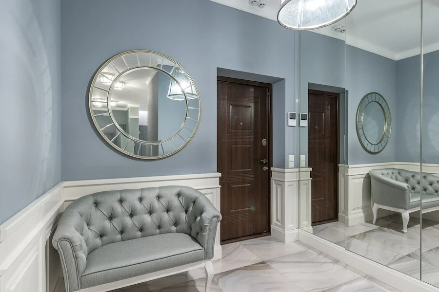 A Nordic-style mirror hung in a room