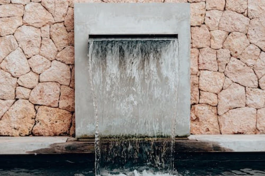 A silver fountain creating a waterfall display