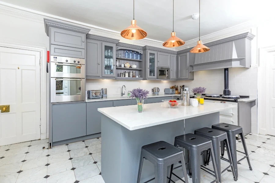 Kitchen island with gray metal counter bar stools