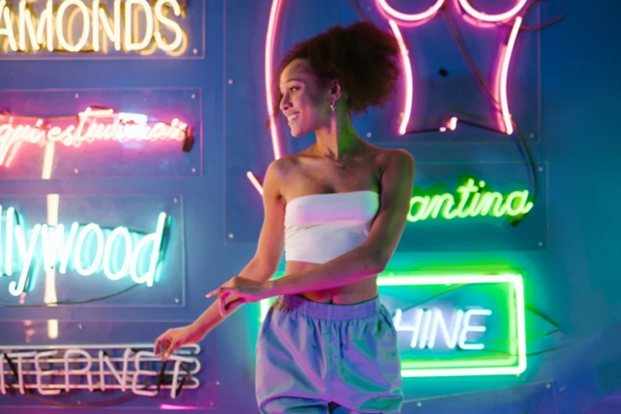 A girl wearing a white cropped top