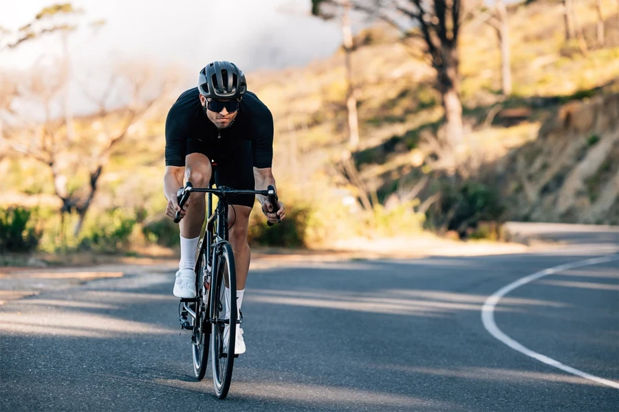 a man riding a road bike