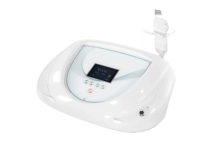 White tabletop ultrasonic skin scrubber on white background