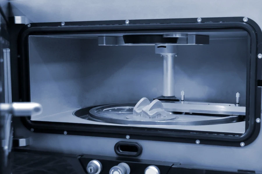 SLS 3D printer printing an object