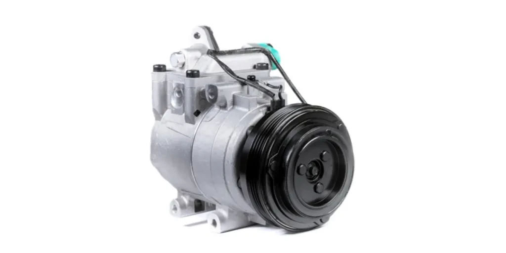 AC compressor placed on top of the car