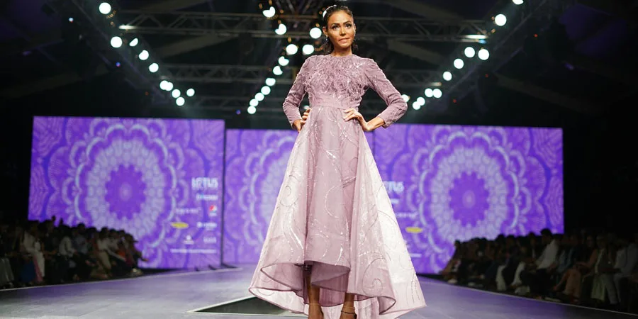 A Model in an Elegant Purple Dress