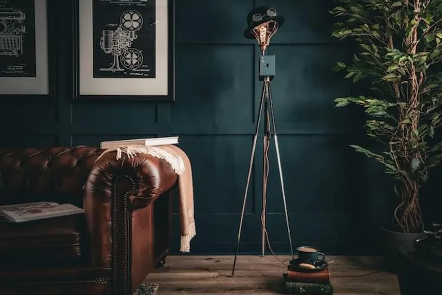 A Victorian-style living room with a couch and floor lamp