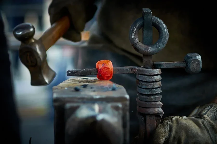 A craftsman working on an industrial vintage metal craft