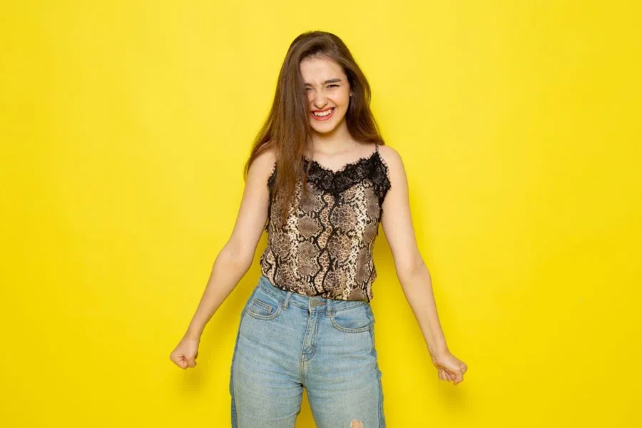 A girl wearing animal print top