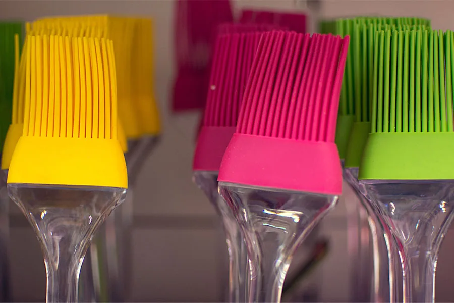 A set of brightly colored pastry brushes