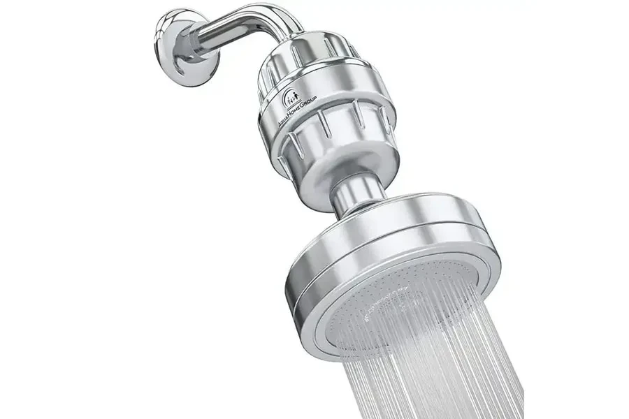 A silver fixed showerhead emitting water