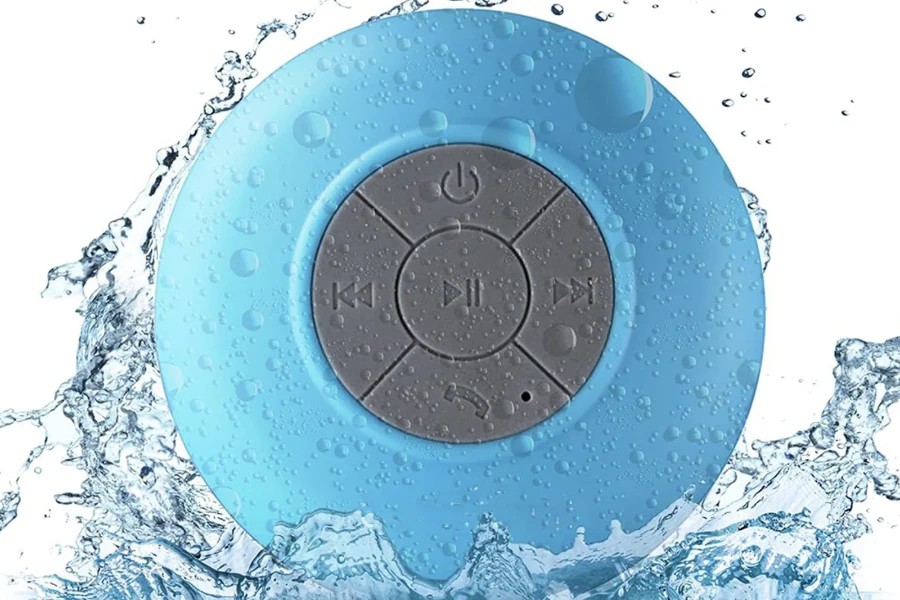 A sky-blue, round-shaped waterproof speaker