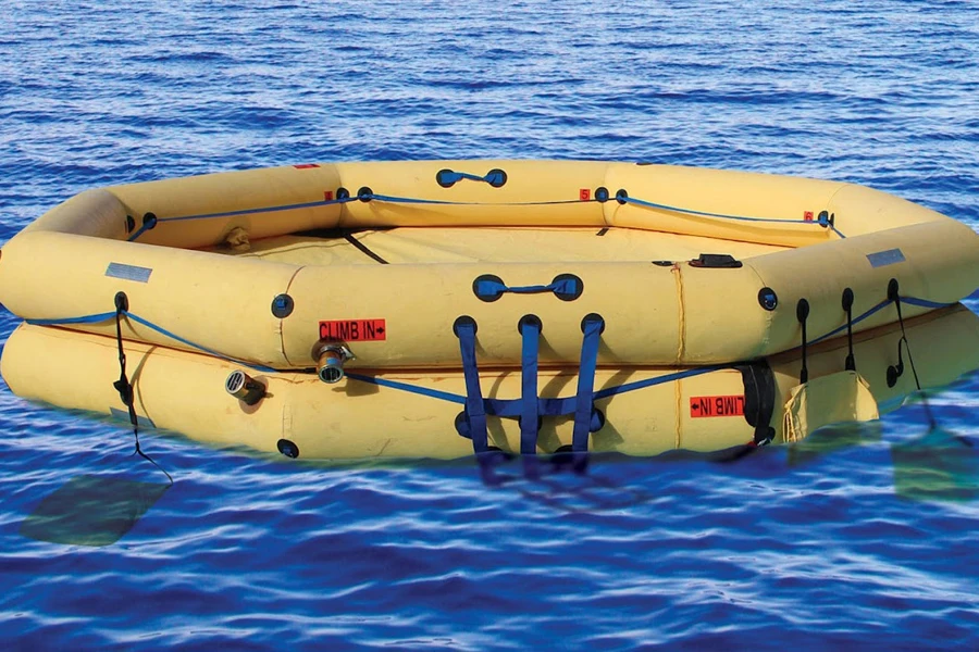 A yellow life raft floating