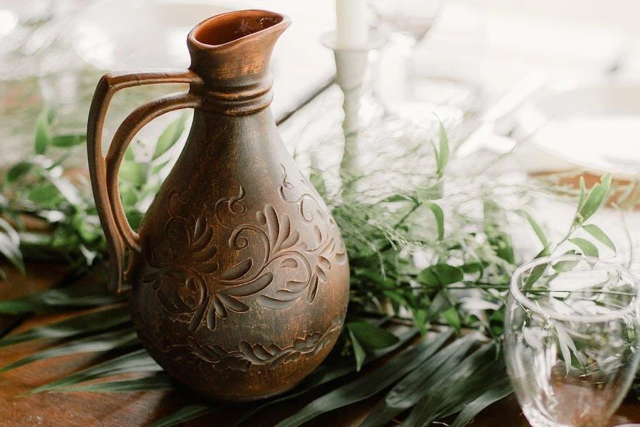 An antique-looking serving jug on a table