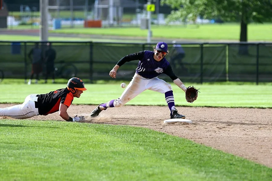 Baseball players in mid-play