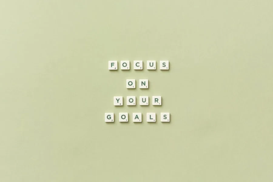 FOCUS ON YOUR GOALS spelled out in Scrabble tiles