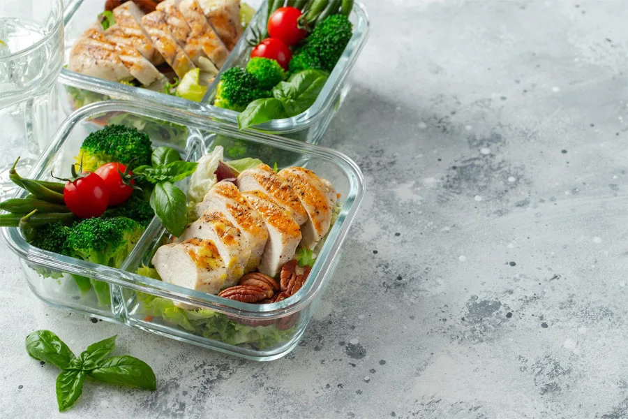 Glass meal prep containers on a kitchen surface
