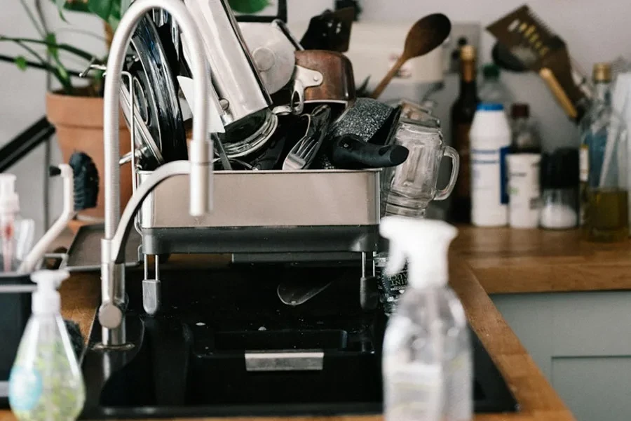 Kitchen sink with steel dish rack drying tray