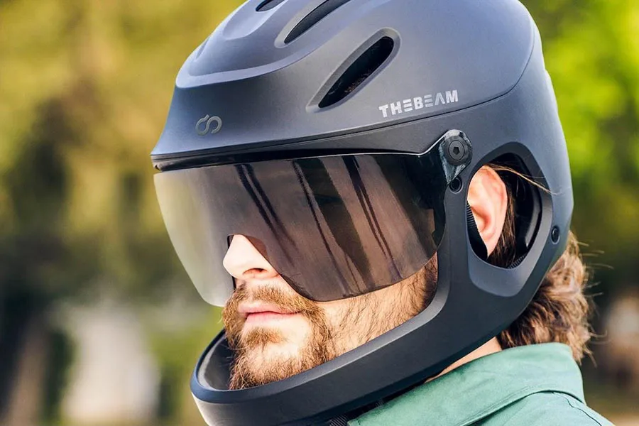 Man wearing a black e-bike helmet