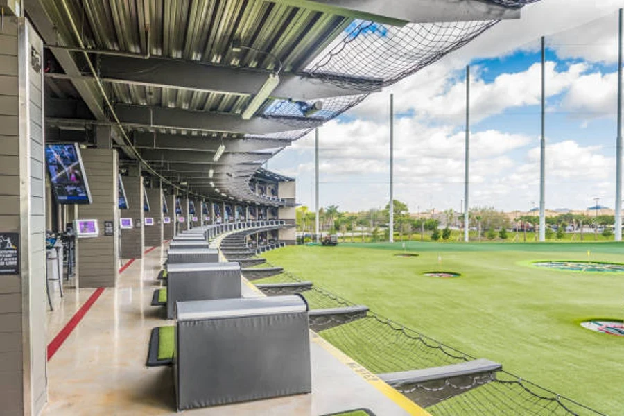 Modern driving range with golf hitting nets set up