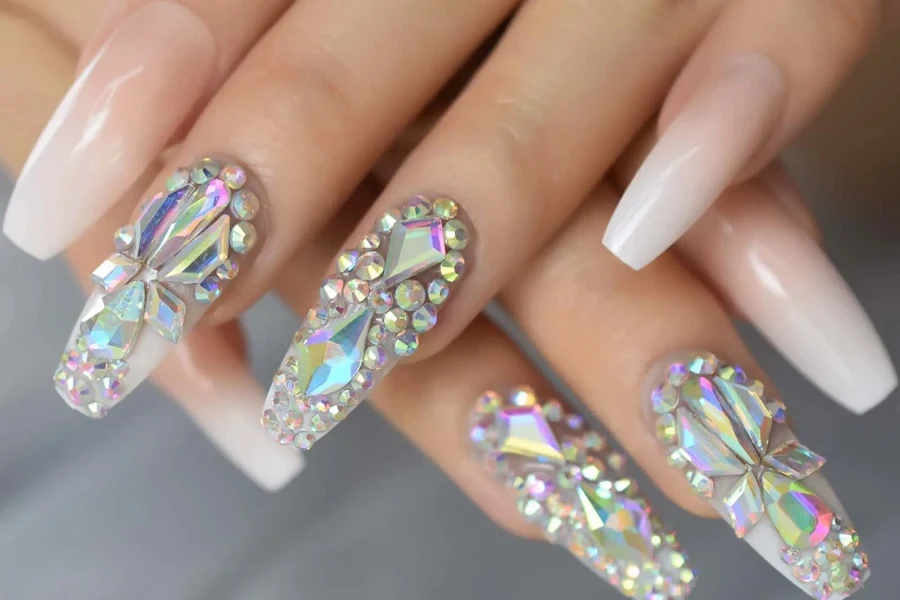 Nail art with different rhinestone sizes