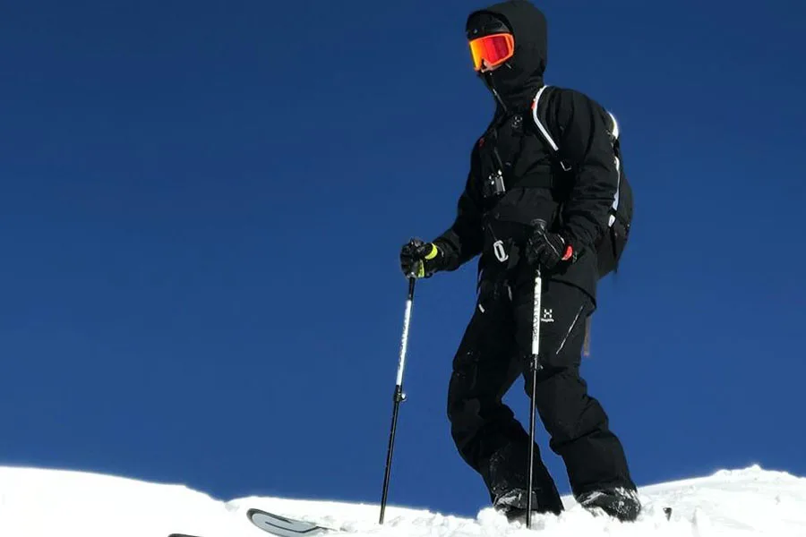 Person wearing black heated gear on a slope