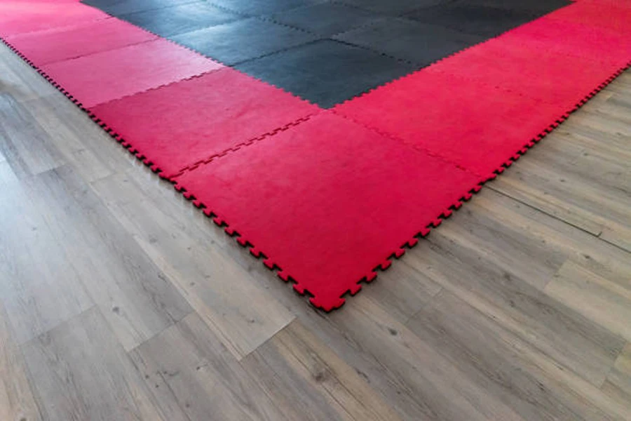 Red and black gymnastics mats slotted together