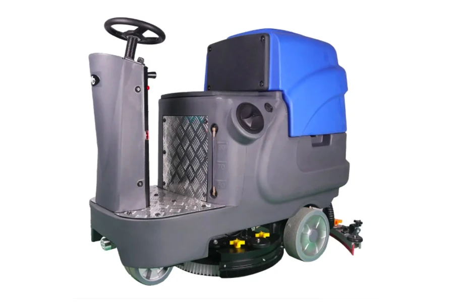 Ride-on floor scrubber with single rotary brush