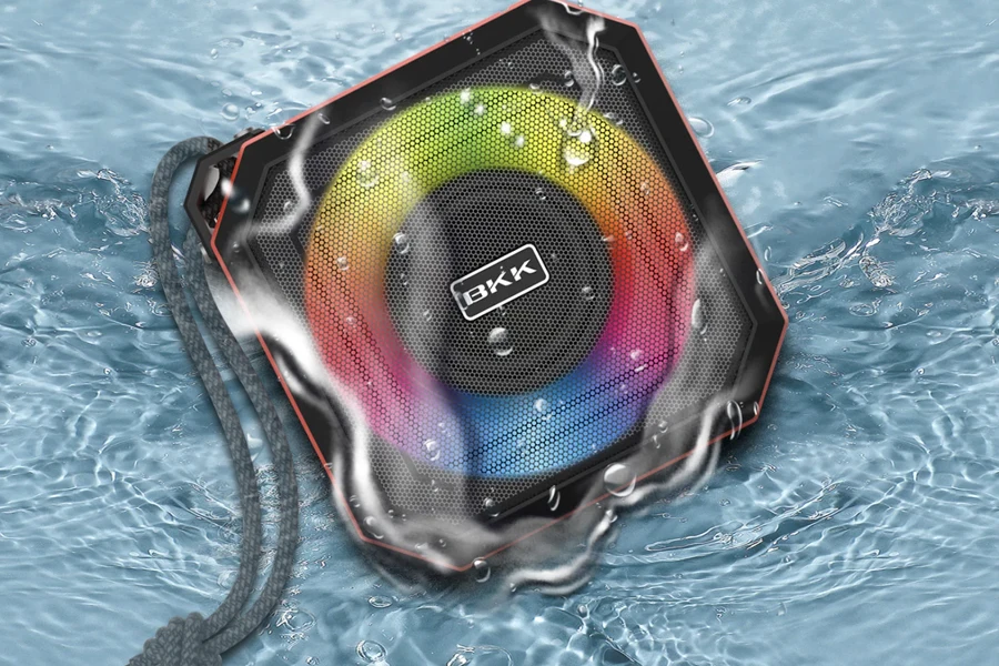 Square-shaped multicolored waterproof speaker immersed in water