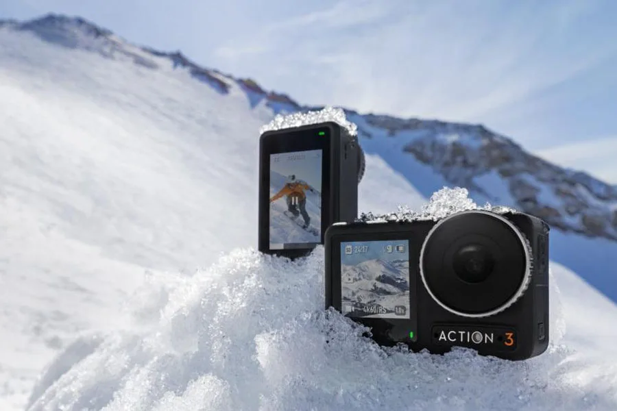 Two action cameras in the snow