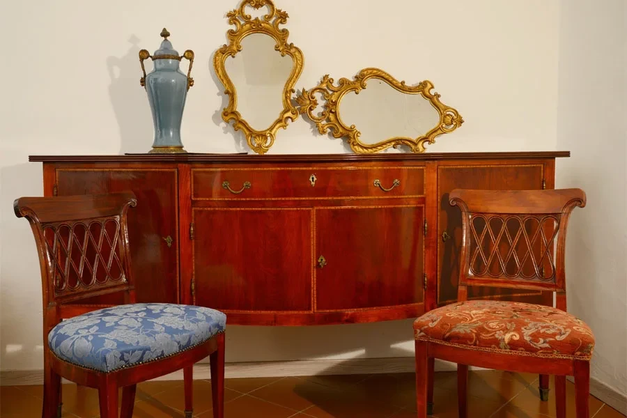 Vintage furniture and mirrors in an entryway