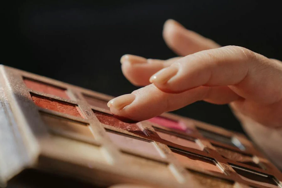 Woman using testing an eyeshadow shade