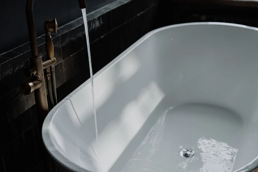 A bathtub being filled with water