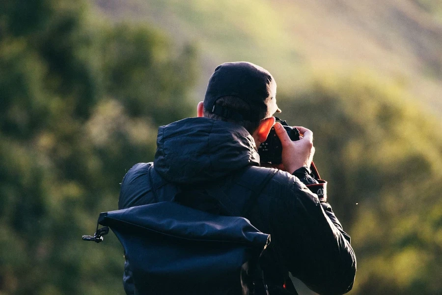 A man taking a shot with natural lighting