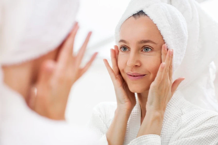 A middle-aged woman looking in the mirror