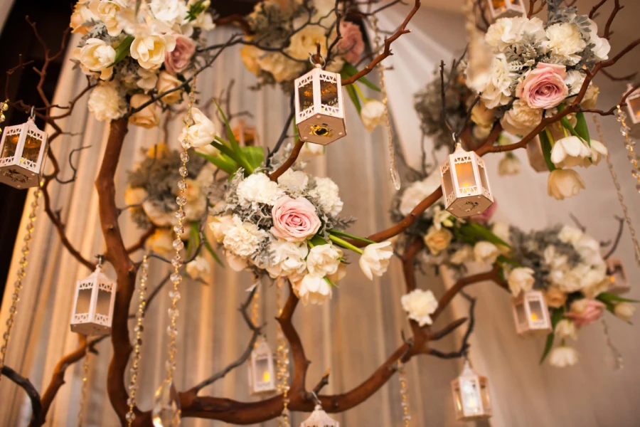 branches hanging florals and lanterns