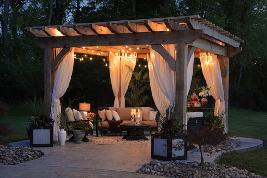 Gazebo with curtains and string lights