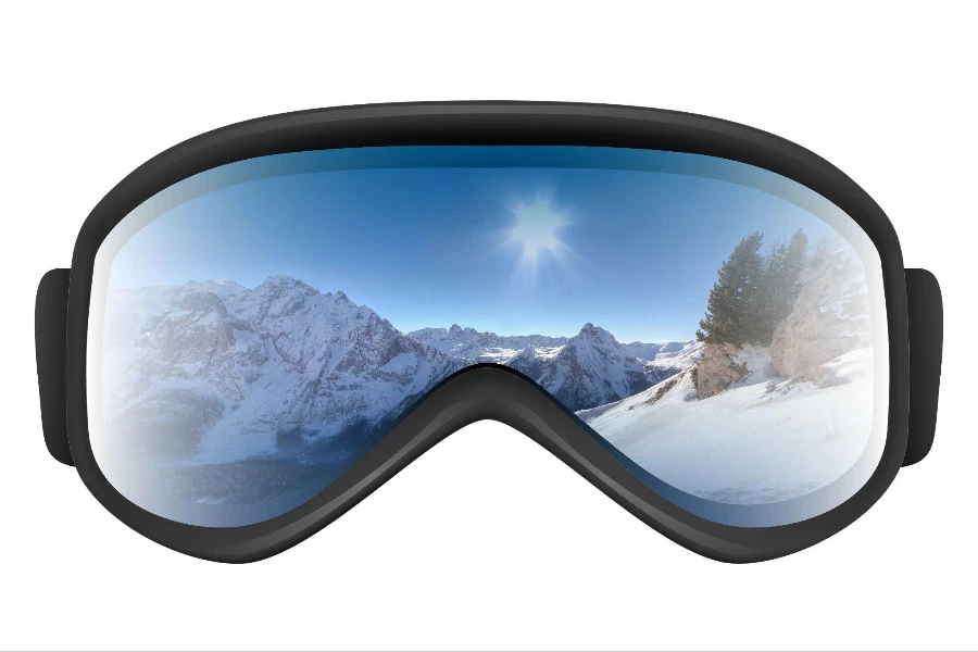 Gafas de esquí con reflejo de montañas aisladas sobre fondo blanco