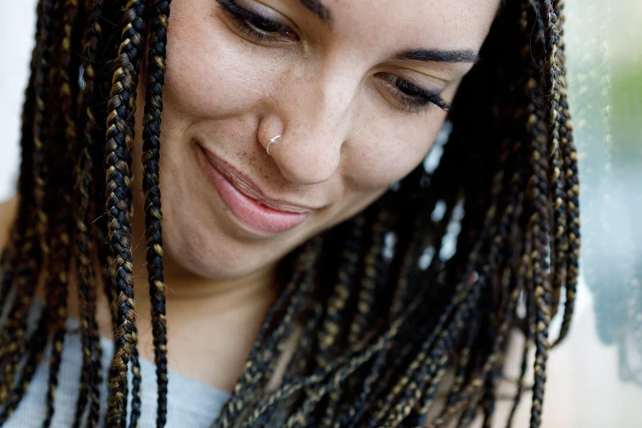 portrait of a girl holding back laughter