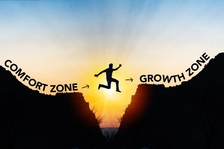 Homem saltando da zona de conforto para a zona de crescimento
