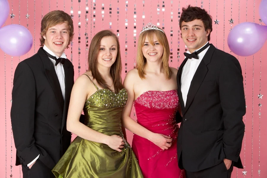 Two Young Couples Dressed For Party