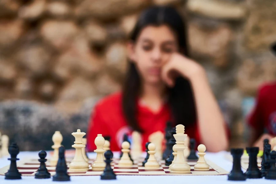 woman playing chess