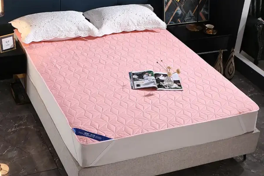 Pink hypoallergenic waterproof mattress protector