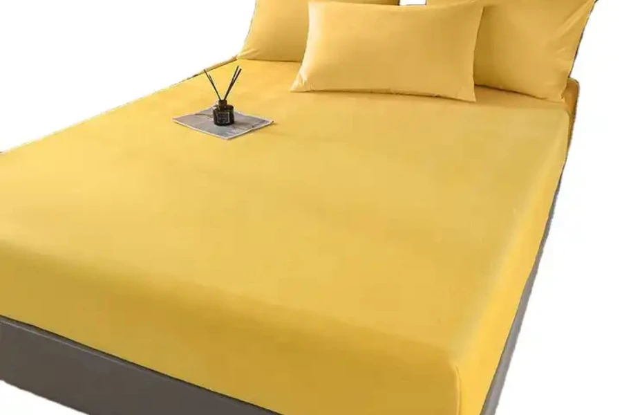 Protetor de colchão amarelo montado e impermeável