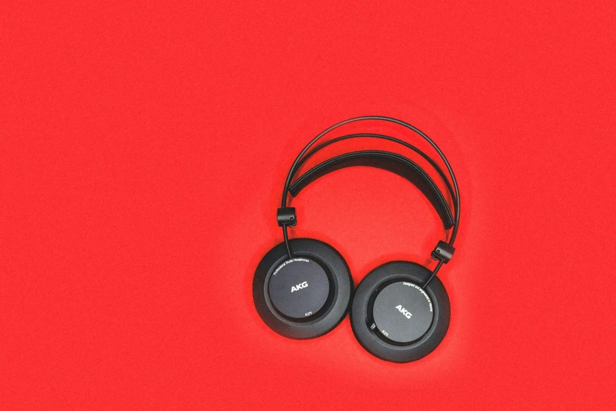 A Pair of Headphones on a Red Background