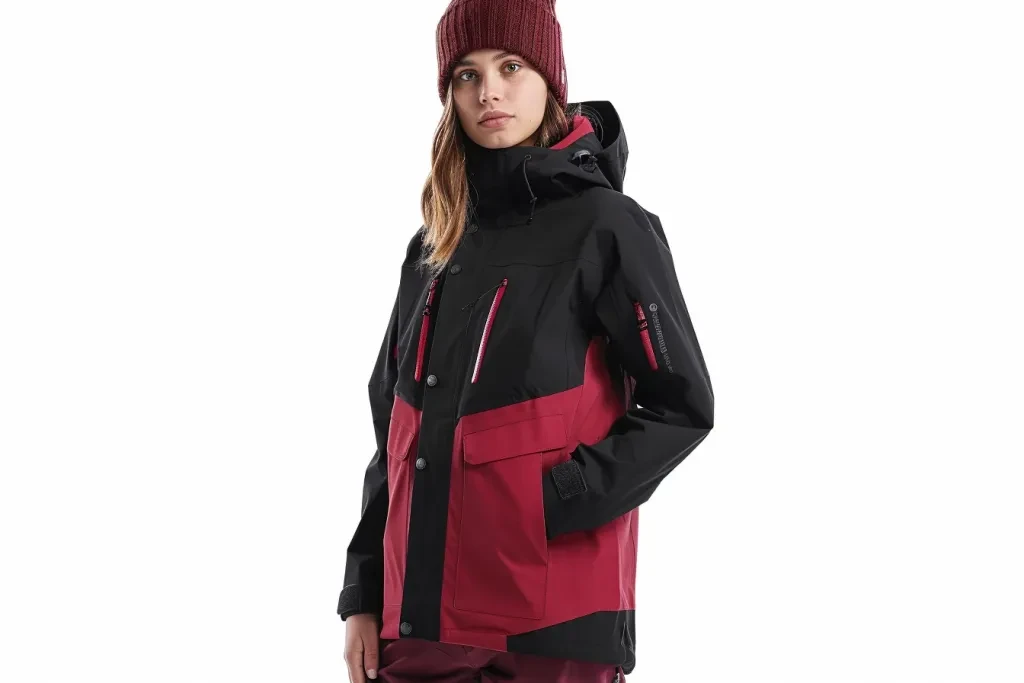 A black and red jacket with zippers