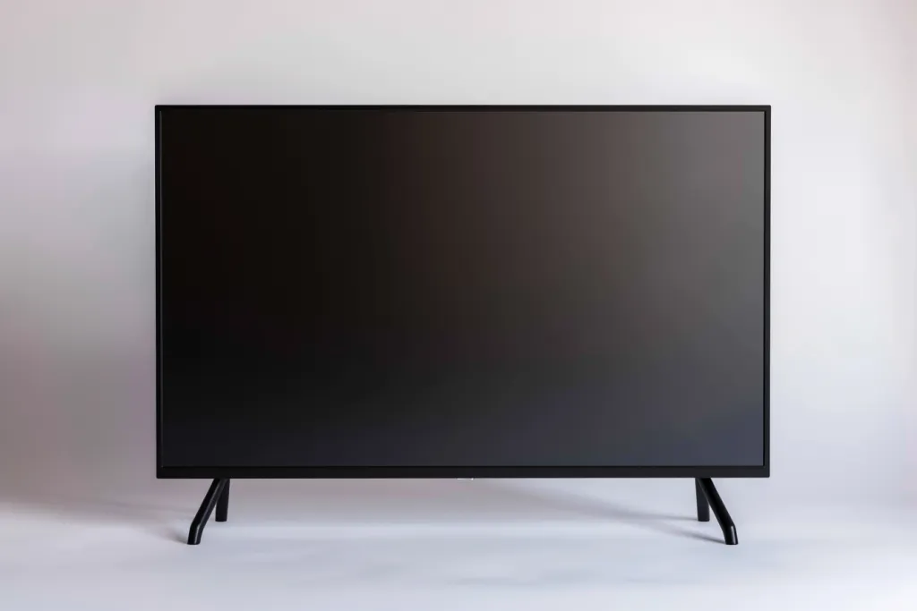 A black flatscreen TV with no picture on it